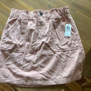 NWT girls Old Navy Corduroy skirt. Size large (10-12). Dusty pink color.